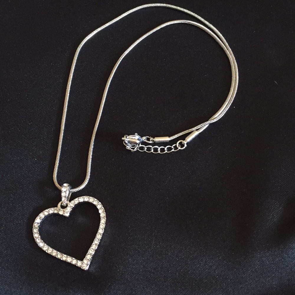 Heart necklace with crystal type stones. 18 inch.